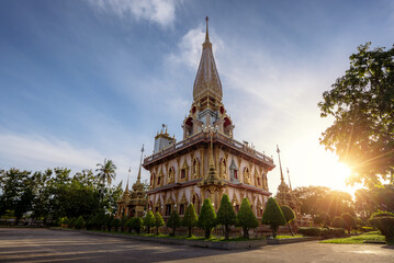 Obraz premium Wat Chalong or Chalong temple the most popular tourist attractions in Phuket, Thailand with sunlight.