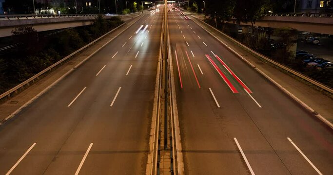 Time lapse of cars driving on a highway at night in 4k