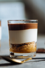 Delicious chocolate and cream dessert in the glass