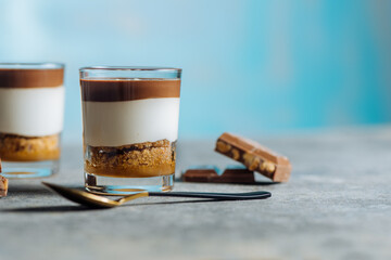 Delicious chocolate and cream dessert in the glass