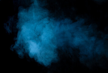 Texture of blue smoke on a black background