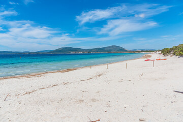 White sand and turquoise sea in Maria Pia beach in Alghero