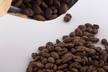 Coffee craft paper bag with coffee bean isolated on white background.