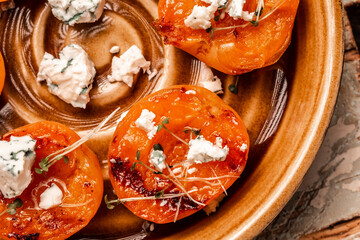 Summer snack sandwiches with grilled peaches, dor blue cheese, wooden background, banner, catering menu recipe