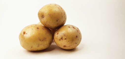 Bunch of potatoes isolated on white background