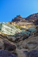 Fototapeta premium Beautiful volcanic landscape in Gran Canaria - colorful rocks of Los Azulejos. Effect of hydromagmatic eruptions.