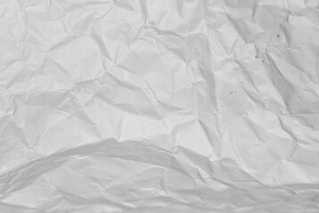 white crumpled paper texture background.