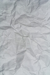 white crumpled paper texture background.