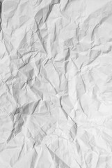 white crumpled paper texture background.