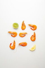 Overhead view of  tiger prawn on light surface