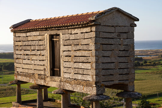 Typical horreo of Galicia in Spain facing the sea. Construction of popular architecture to store grain and other products of the field. 