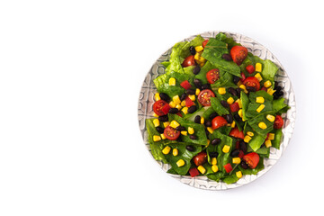 Mexican salad with black beans, corn,tomatoes,lettuce and pepper isolated on white background. Top view. Copy space