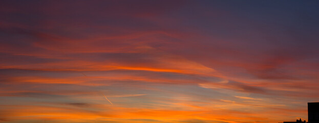 sunset over the city. red sky