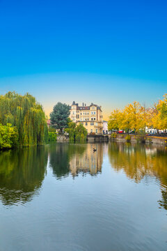 detmold castle with canal and water reflection