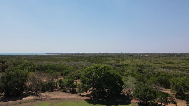 Aerial Rotating drone shot of Fannie bay and football oval in Darwin, Northern Territory