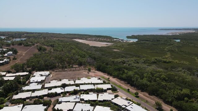 Bird Flying in front of Aerial Drone shot of Fannie Bay in Darwin, Northern Territory