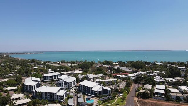 Rotating Aerial drone shot of Fannie bay, Darwin skyline and Racetrack in Northern Territory