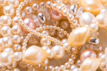 Lot of different glass beads, seed beads on white background