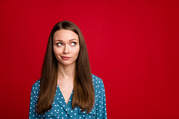 Close-up portrait of attractive doubtful brown-haired girl overthinking deciding isolated bright red color background