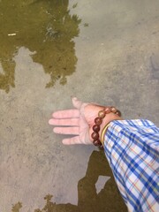 Hand in water