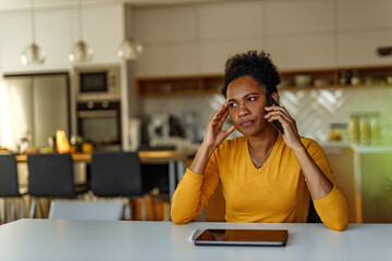 Using digital tablet, while talking over the phone.