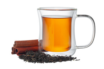 Glass cup of tea and cinnamon sticks isolated on white
