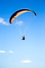 Paraglider flying above Mediterranean in Arsuf, Israel