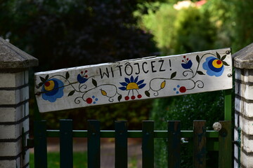 Traditional Kashubian pattern painted on the plank.