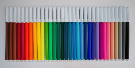 
early colored markers with white caps