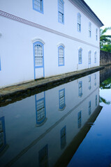 Fototapeta na wymiar colonial house and reflection