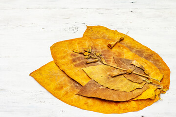 High quality rough dry tobacco leaves and flowers are ready to be made cigarettes