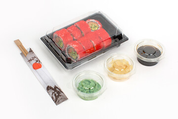 California rolls in black plastic container