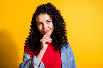 Photo of charming girl arm chin look empty space thoughtful tricky wear red t-shirt jacket isolated...