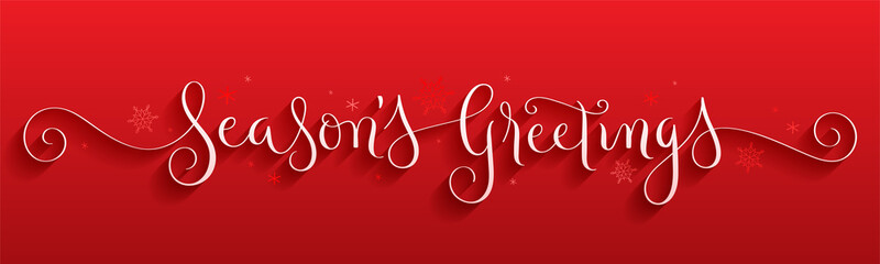 SEASON'S GREETINGS white brush calligraphy with spiral swashes and snowflakes on red background © HowLettery Studio