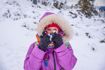 Fototapeta na wymiar child in winter weather outdoors