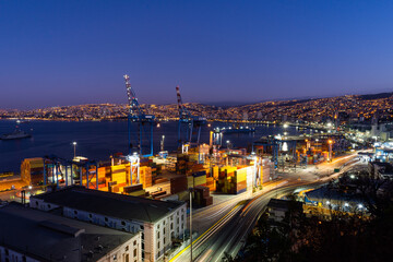 Valparaiso port at night with hills at behind