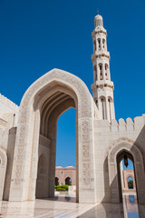 Fototapeta na wymiar Courtyard and Minaret in Sultan Qaboos Grand Mosque, Muscat, Oman