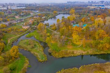 View of Loshitsa Usaba in Minsk! Orange and yellow alleys! river and pond in the frame. Photo from a quadcopter.