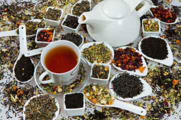 Assortment of dry tea. Various kinds of tea isolated on white.Different kinds of tea leaves. Tea...