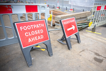 Footpath closed sign for pedestrian safety from road construction