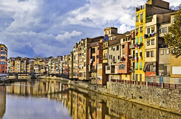 Fototapeta na wymiar Cramped buildings lining a European canal