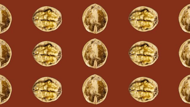 4K 60FPS Animated Loop Background -  Walnuts Flowing Horizontally and Rotating