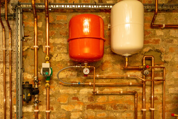 Air source heat pump. Installation pipework and tanks. Sustainable and environmentally friendly.