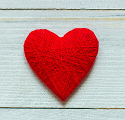 Naklejka na ściany i meble Background with wooden heart, Valentines day. Valentines day greeting card. Heart on a wooden background. Heart of love