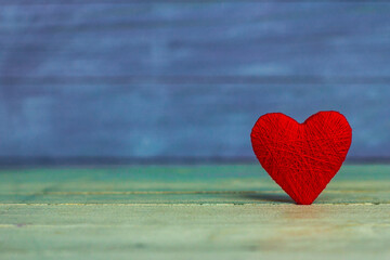 Background with wooden heart, Valentines day. Valentines day greeting card. Heart on a wooden background. Heart of love