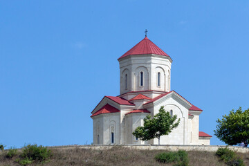 Fototapeta na wymiar white Church with red roof
