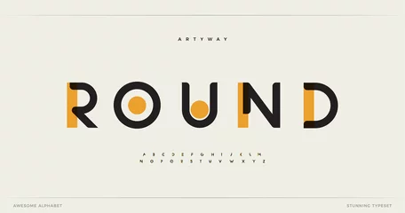 Fotobehang Round modern alphabet. Dropped stunning font, type for futuristic logo, headline, creative lettering and maxi typography. Minimal style letters with yellow spot. Vector typographic design © artyway