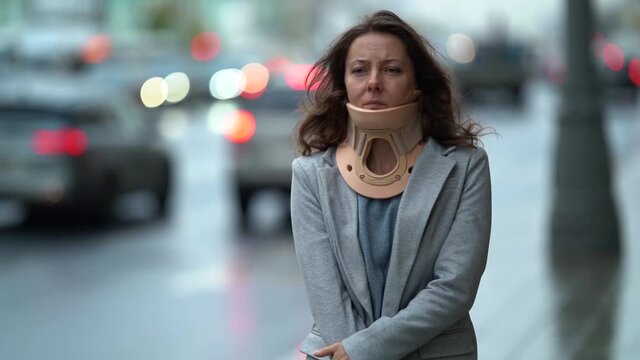 woman with chronic neck pain, portrait of unhappy woman, cervical collar or neck brace for curing