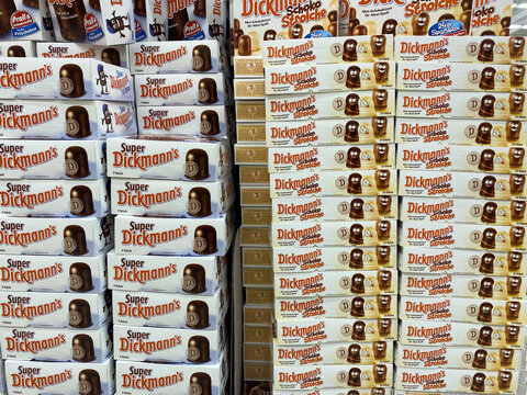 T&ouml;nisvorst, Germany - June 18. 2020: View on isolated stacked Dickmann&acute;s Schokok&uuml;sse boxes in german supermarket