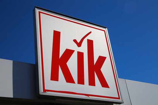 Heinsberg, Germany - March 23. 2020: Close up of isolated sign of german Kik non-food textile discounter chain against clear blue sky